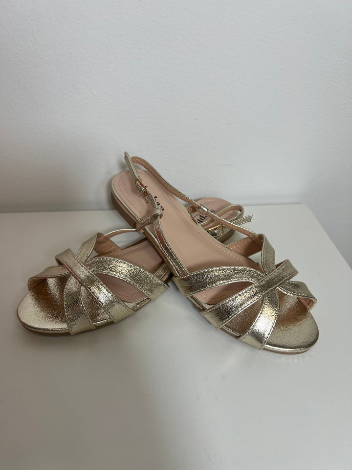 Naomi Sandal Gold